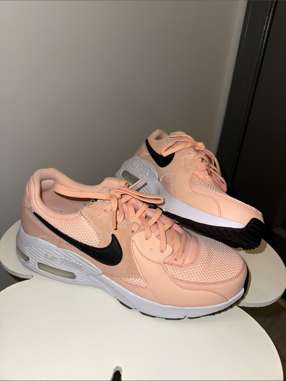 Nike Women's Peach Athletic Sneakers with Black Swoosh